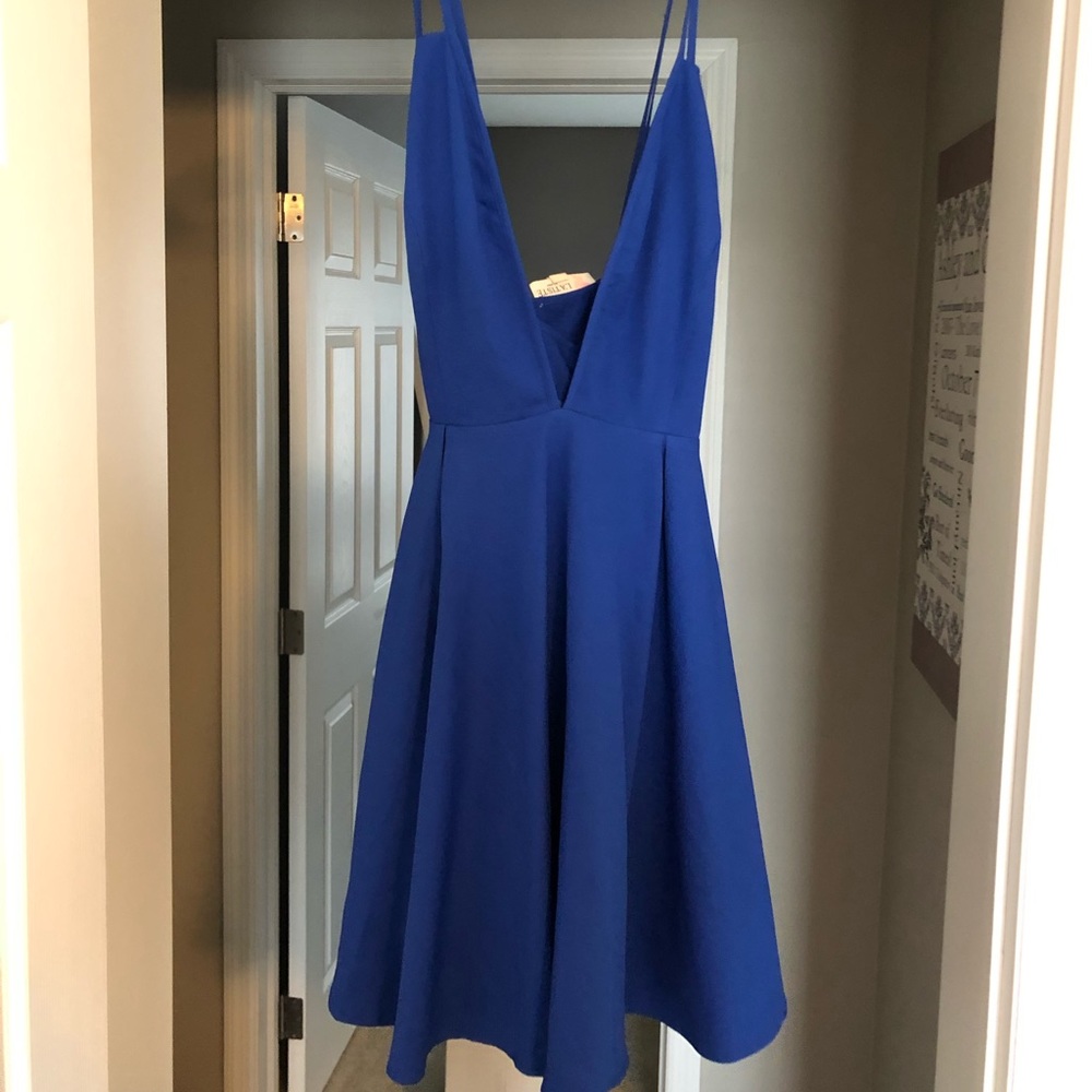 Blue cocktail dress with deep V